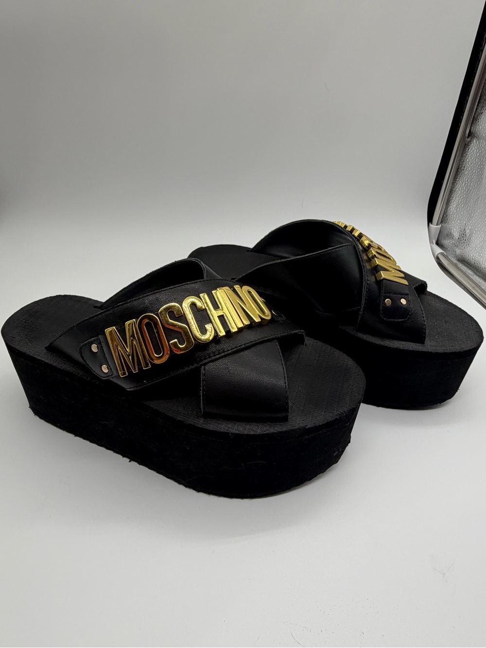 Moschino Black Platform Slides with Gold Lettering